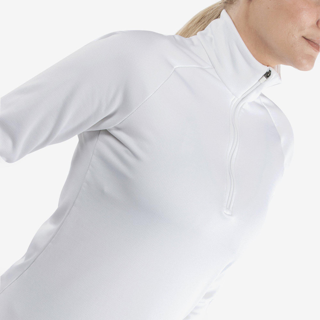 Dolly is a Insulating golf mid layer for Women in the color White(3)