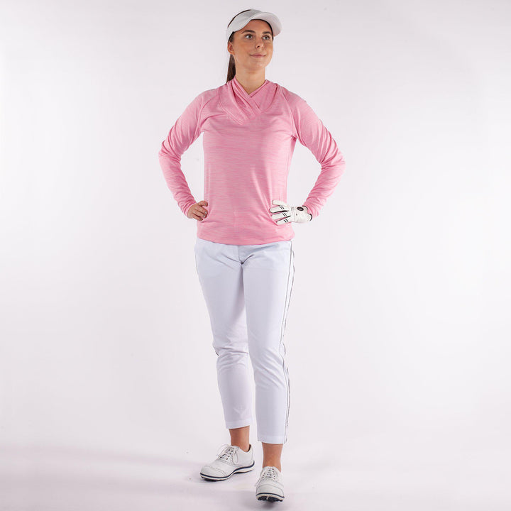 Dorali is a Insulating golf mid layer for Women in the color Imaginary Pink(2)