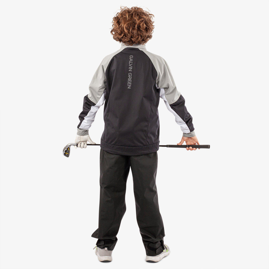 Remi is a Windproof and water repellent golf jacket for Juniors in the color Black/Sharksin/White(9)