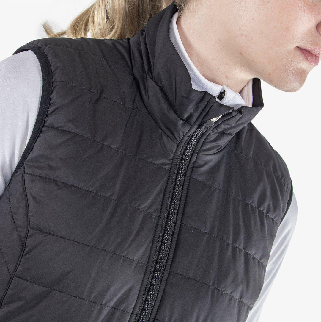 Lene is a Windproof and water repellent vest for  in the color Black(3)
