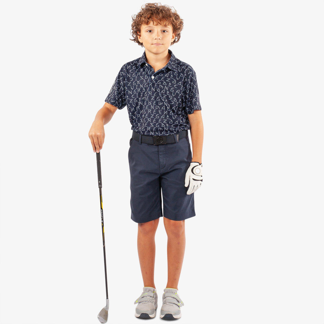 Rickie is a Breathable short sleeve golf shirt for Juniors in the color Navy(2)