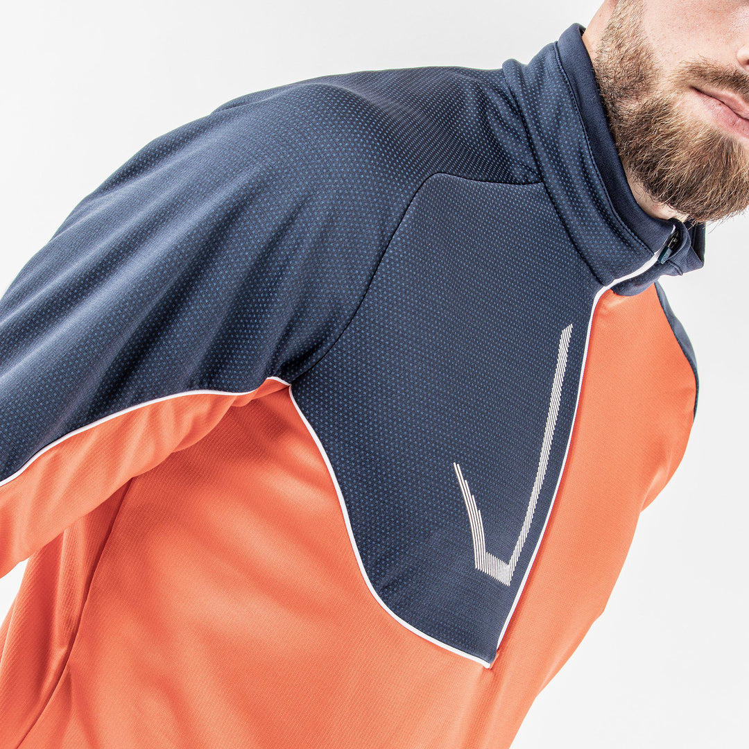 Daxton is a Insulating mid layer for Men in the color Orange(3)