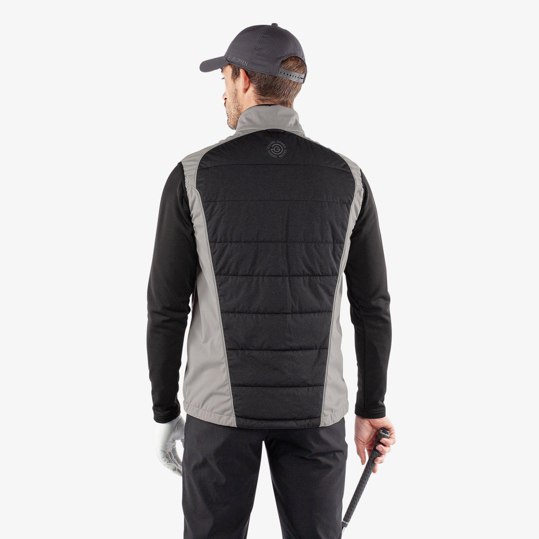 Lauro is a Windproof and water repellent vest for  in the color Sharkskin/Black(5)