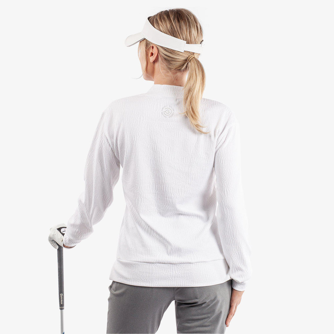 Donya is a Insulating golf mid layer for Women in the color White(6)
