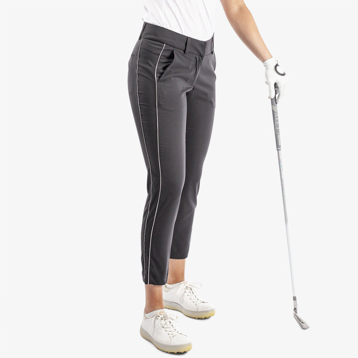Nicole is a Breathable golf pants for Women in the color Black/Steel Grey(1)