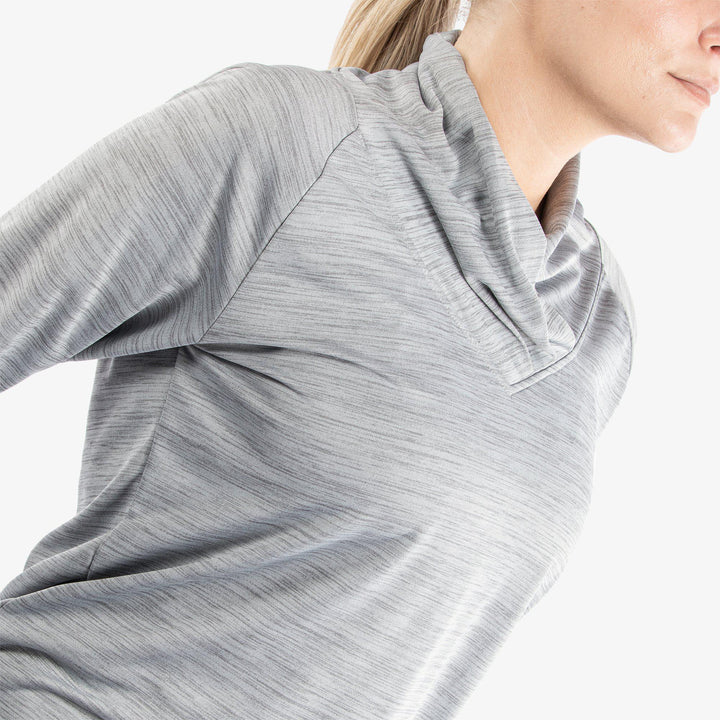 Dorali is a Insulating golf mid layer for Women in the color Cool Grey(3)
