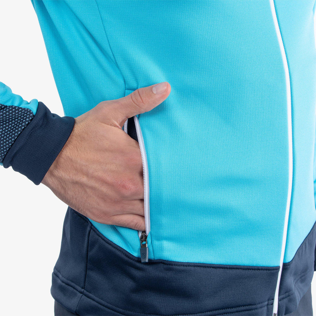 Dawson is a Insulating golf mid layer for Men in the color Aqua/Navy(4)