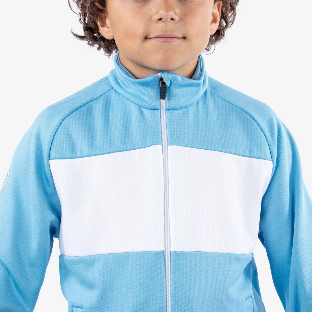 Rex is a Insulating golf mid layer for Juniors in the color Alaskan Blue/White(5)