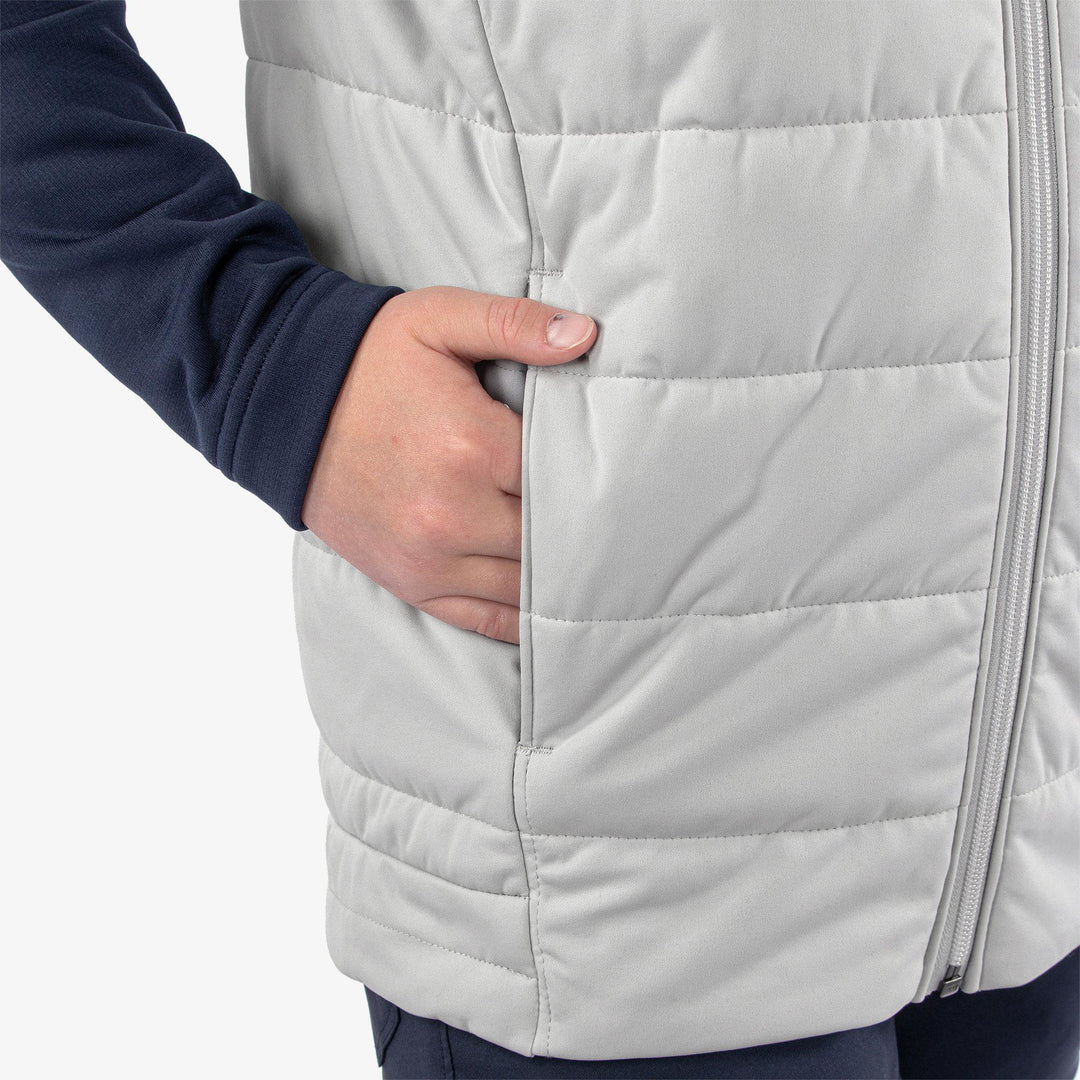 Ronie is a Windproof and water repellent golf vest for Juniors in the color Cool Grey/White(5)