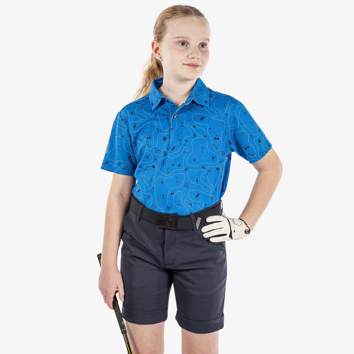 Rowan is a Breathable short sleeve golf shirt for Juniors in the color Blue/Navy(1)