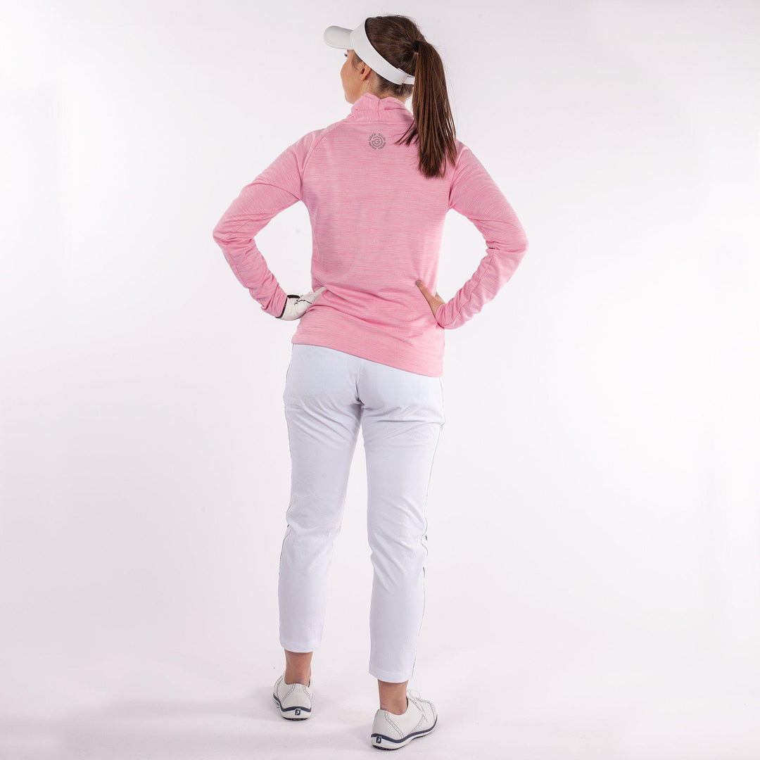 Dorali is a Insulating golf mid layer for Women in the color Imaginary Pink(6)