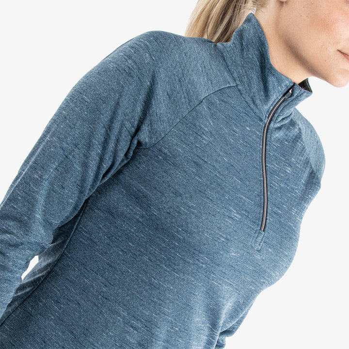 Diora is a Insulating golf mid layer for Women in the color Blue Melange (3)