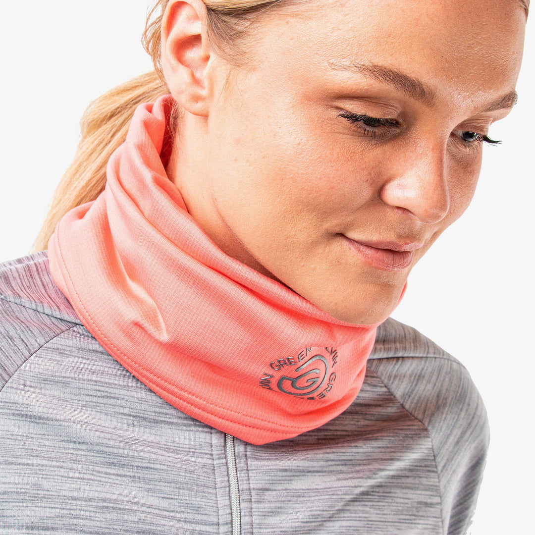 Dex is a Insulating golf neck warmer in the color Coral(2)