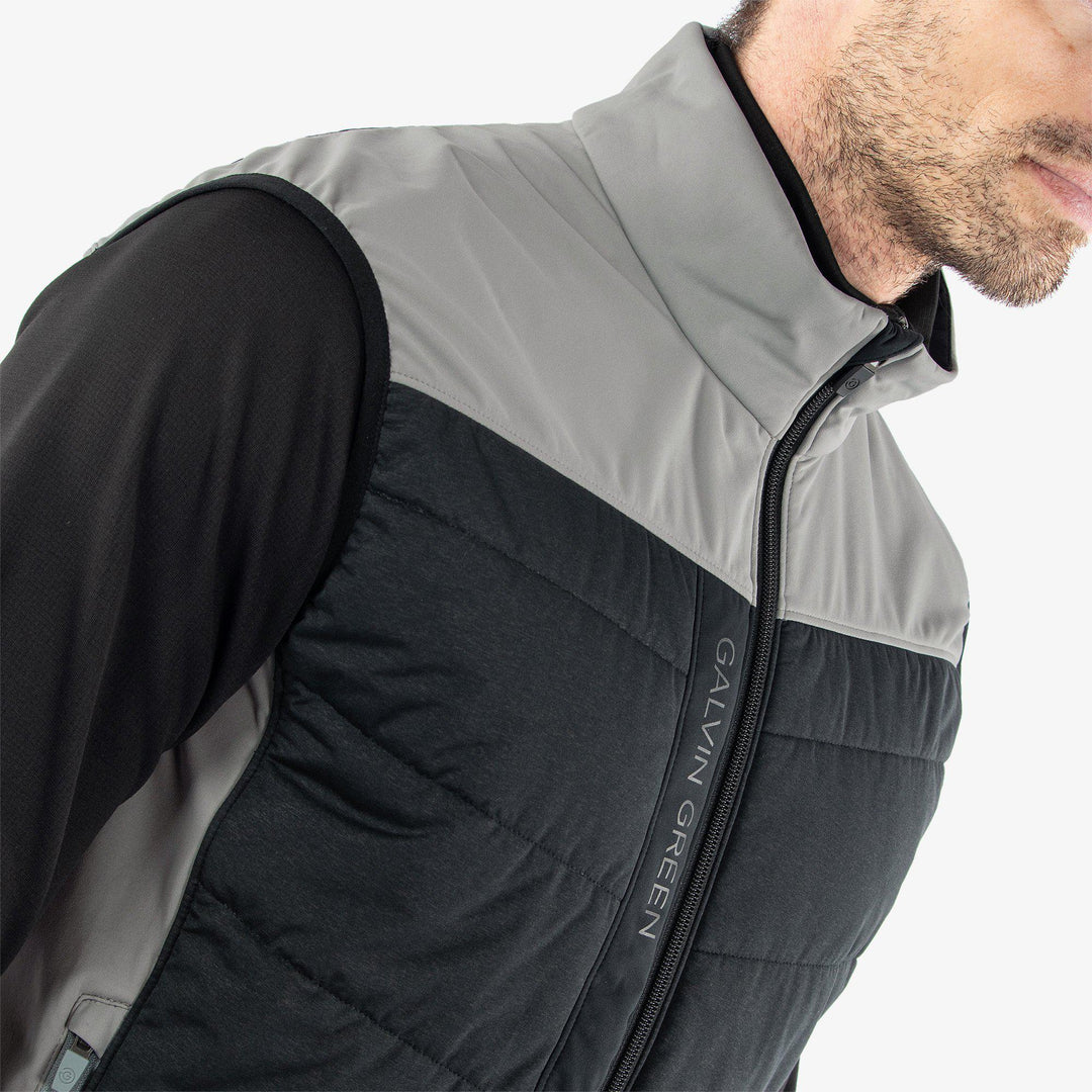 Lauro is a Windproof and water repellent golf vest for Men in the color Sharkskin/Black(2)