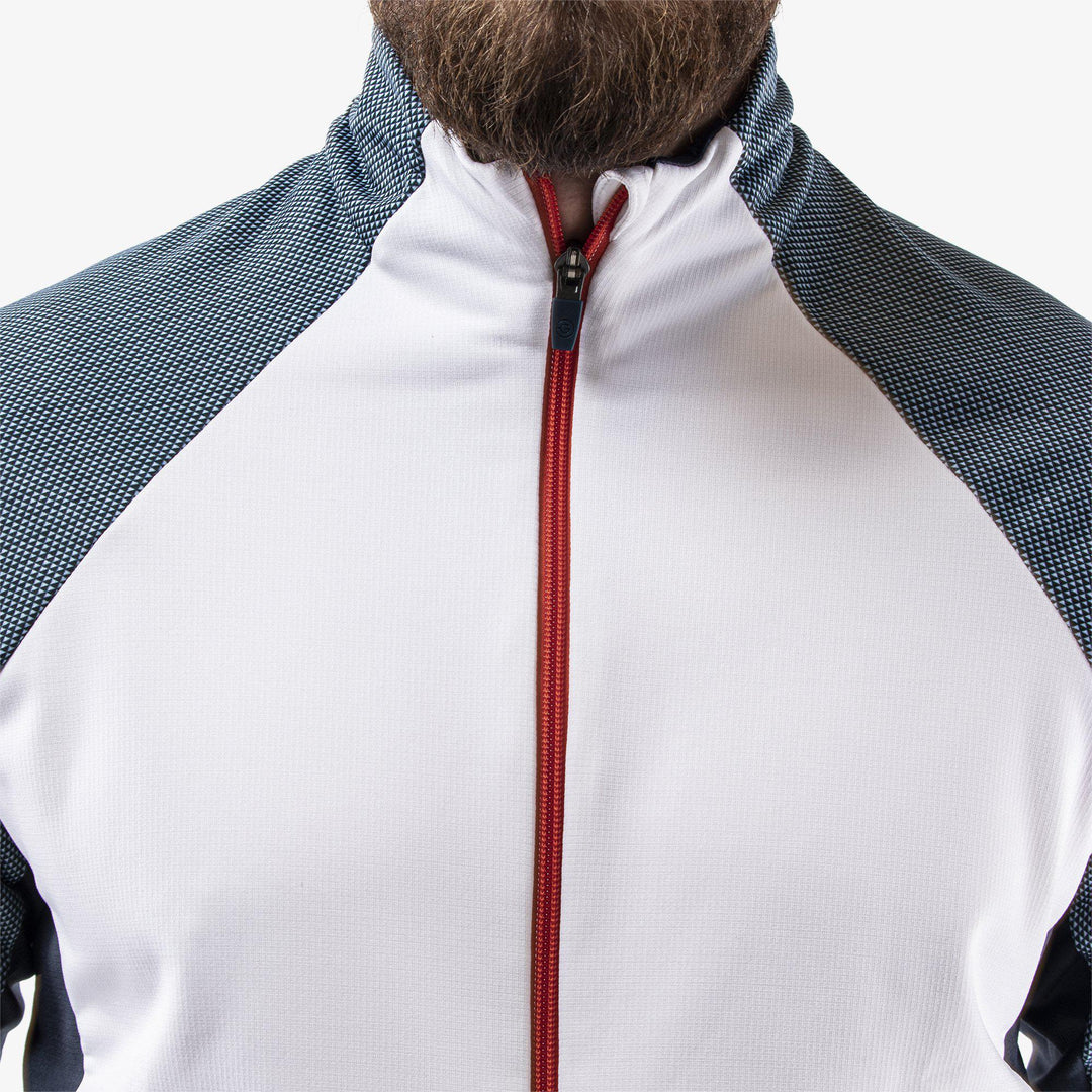 Donald is a Insulating golf mid layer for Men in the color White/Navy/Orange(3)