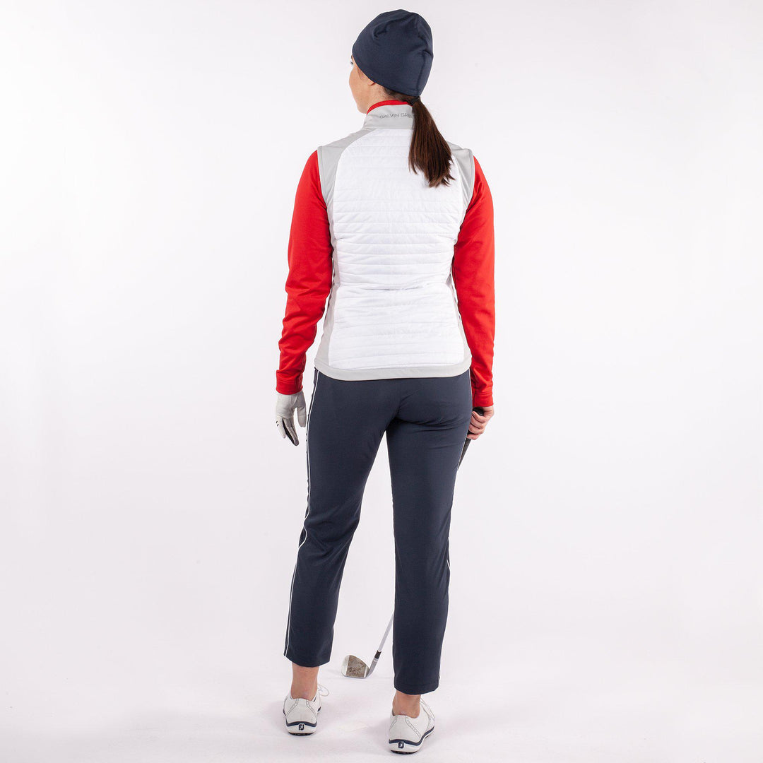 Lisa is a Windproof and water repellent golf vest for Women in the color White base(4)