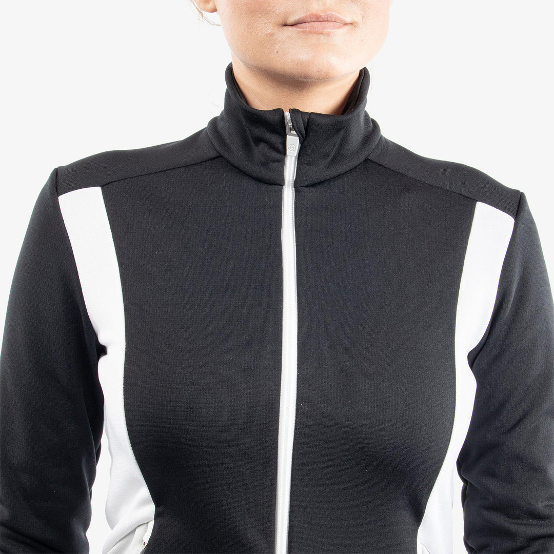 Donella is a Insulating golf mid layer for Women in the color Black/White/Cool Grey(4)