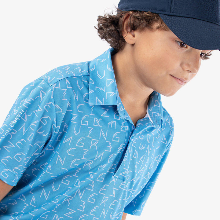 Rickie is a Breathable short sleeve golf shirt for Juniors in the color Alaskan Blue(3)
