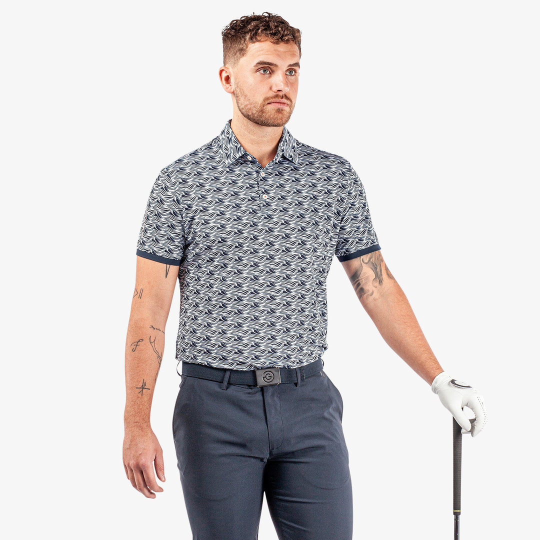 Madden is a Breathable short sleeve golf shirt for Men in the color Navy/White(1)