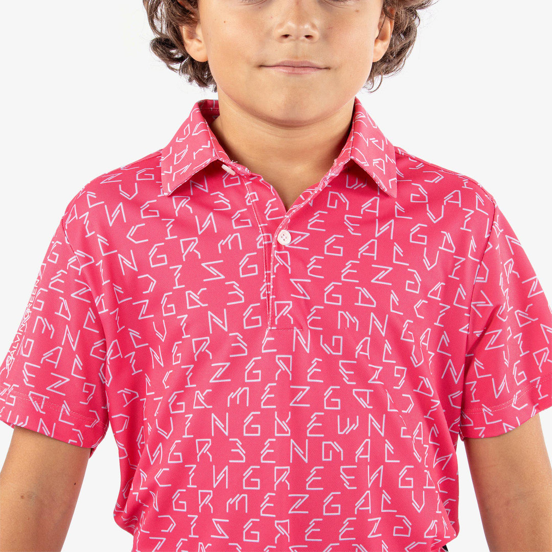 Rickie is a Breathable short sleeve golf shirt for Juniors in the color Camelia Rose(6)