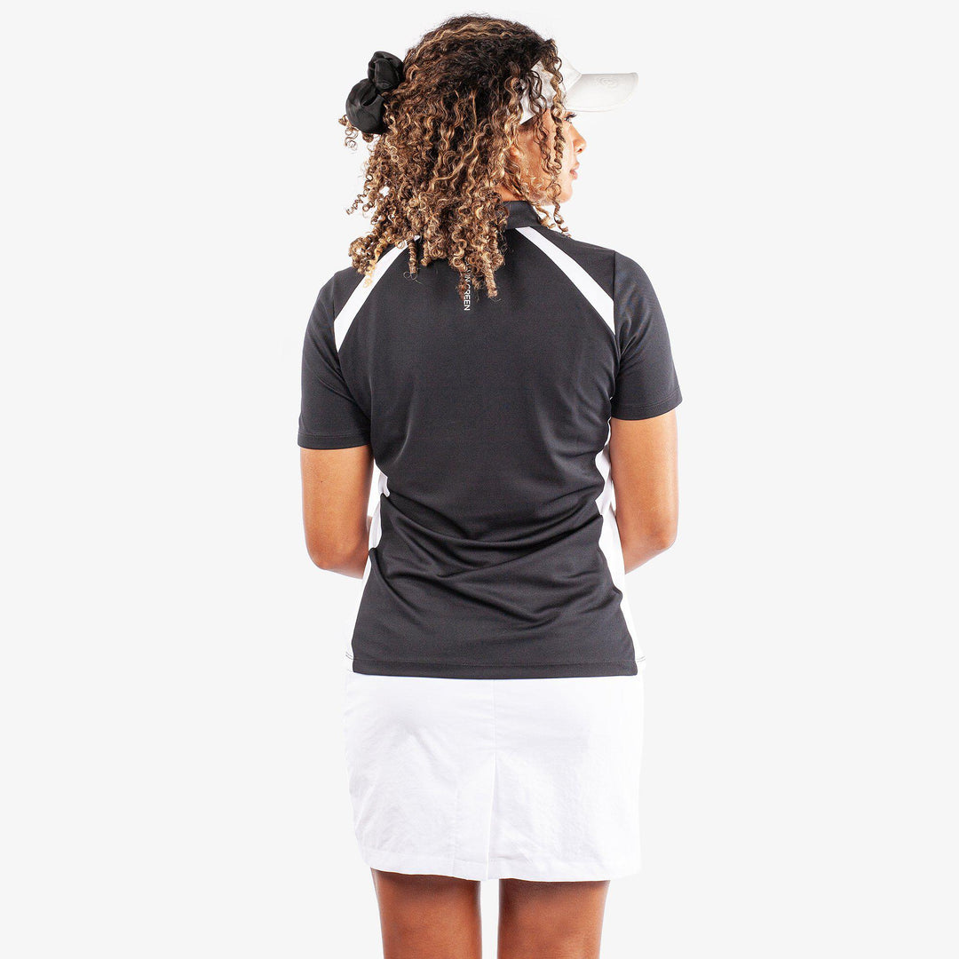 Mirelle is a Breathable short sleeve golf shirt for Women in the color Black/White(4)